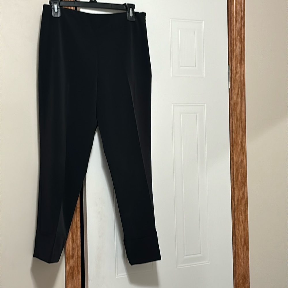 Very nice size 4 black ankle length wide cuff trousers.